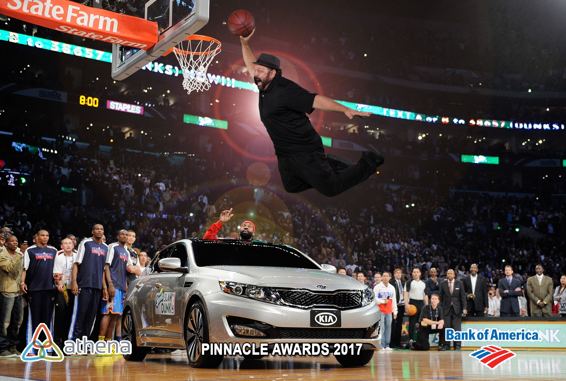 An amazing slam dunk over a car.